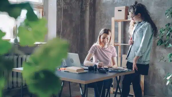Small business owner reviewing legal advice with a lawyer